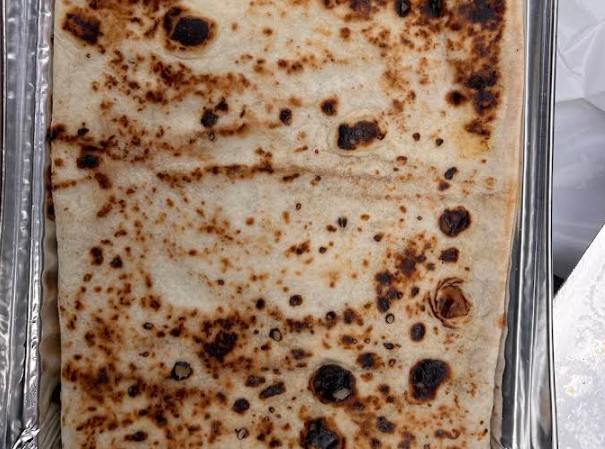 Hot-off-the-tawa roti at Mother India Roti Queen St West