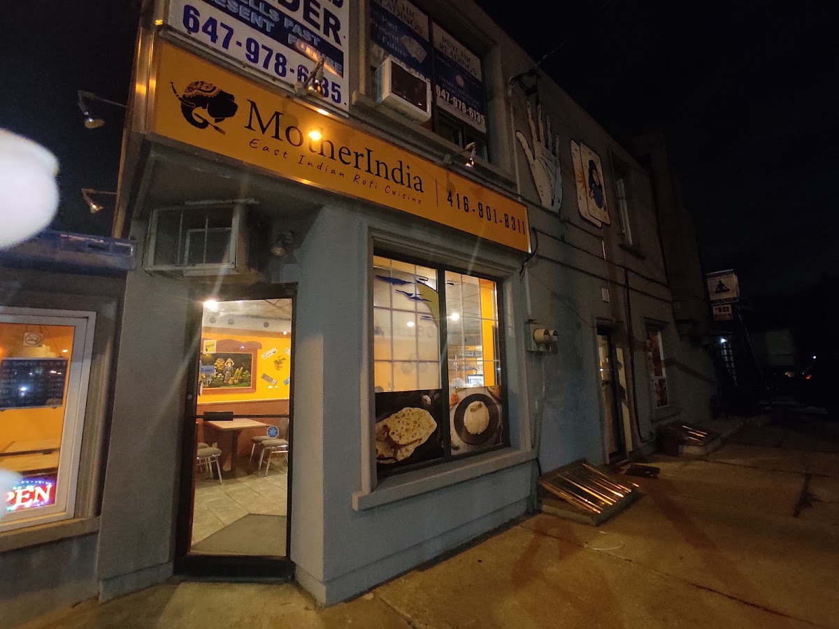 Mother India Roti on St Clair Ave W at dusk