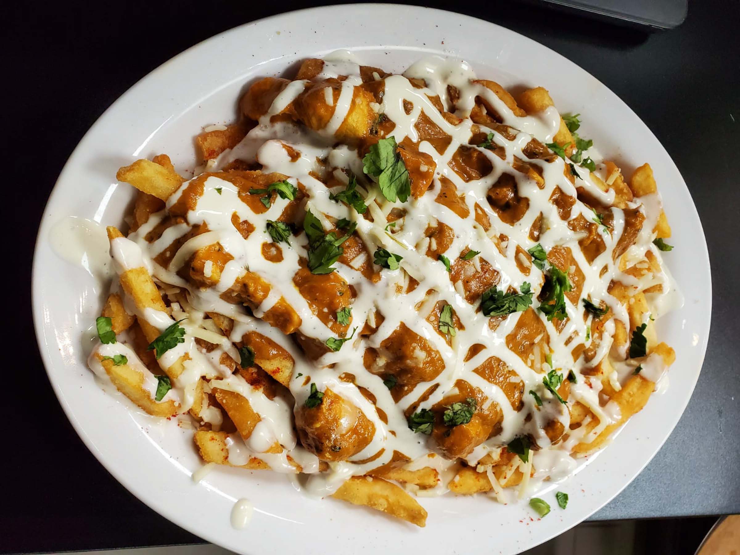 Maurya Indian Restaurants - Samosa Poutine Veggie